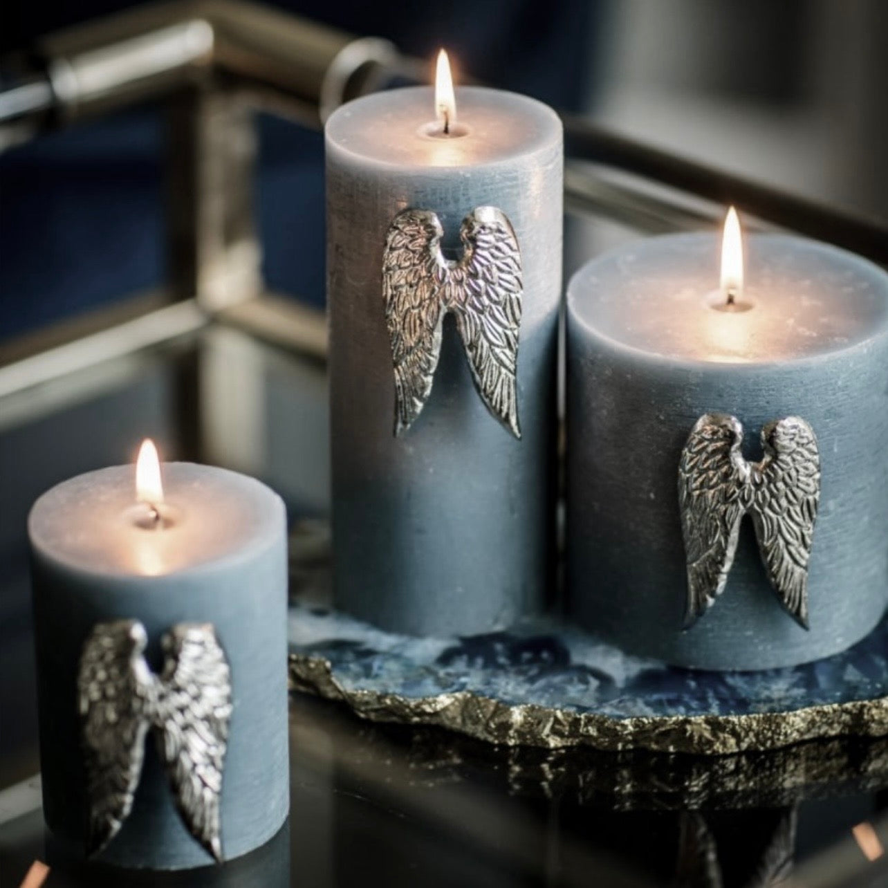 Set of three angel wing candle pins in nickel plated aluminium designed for decorative church candles by Angel Rocks