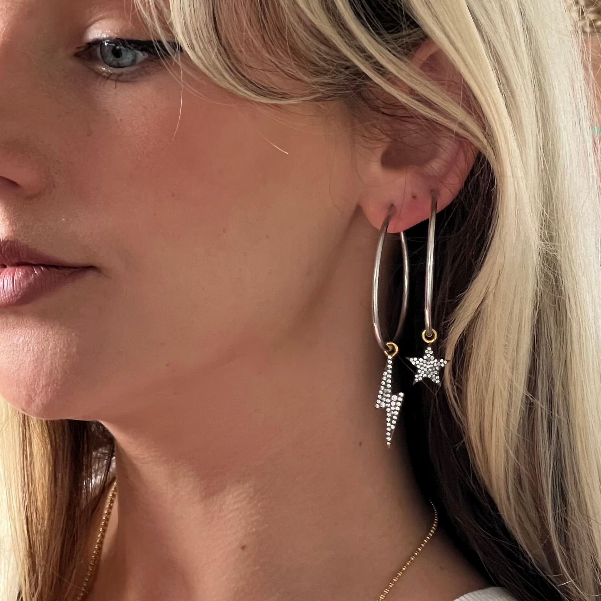 Sterling silver Bowie hoop earrings with detachable cosmic grey diamanté star and lightning bolt charms in mixed metal finish by Angel Rocks