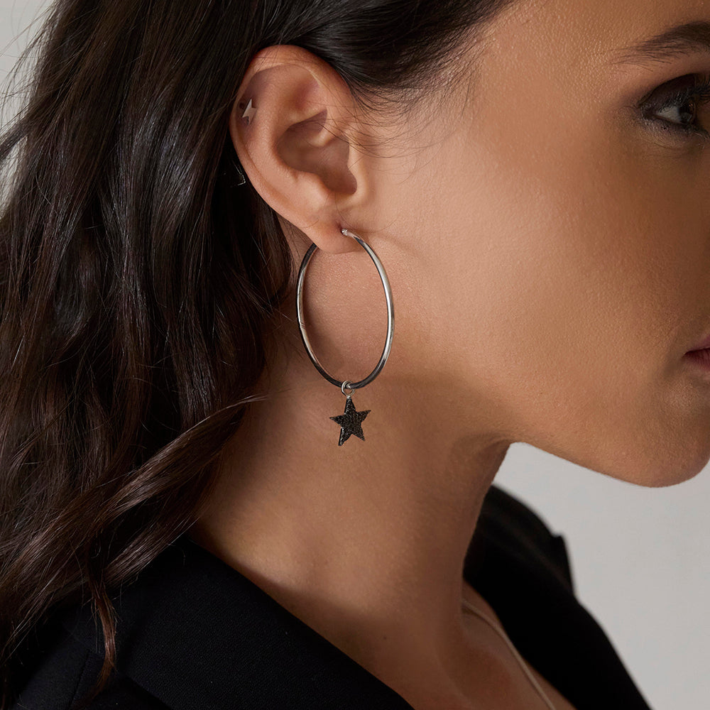 Sterling silver Bowie hoop earrings with detachable black diamanté star and lightning bolt charms, cosmic statement earrings by Angel Rocks