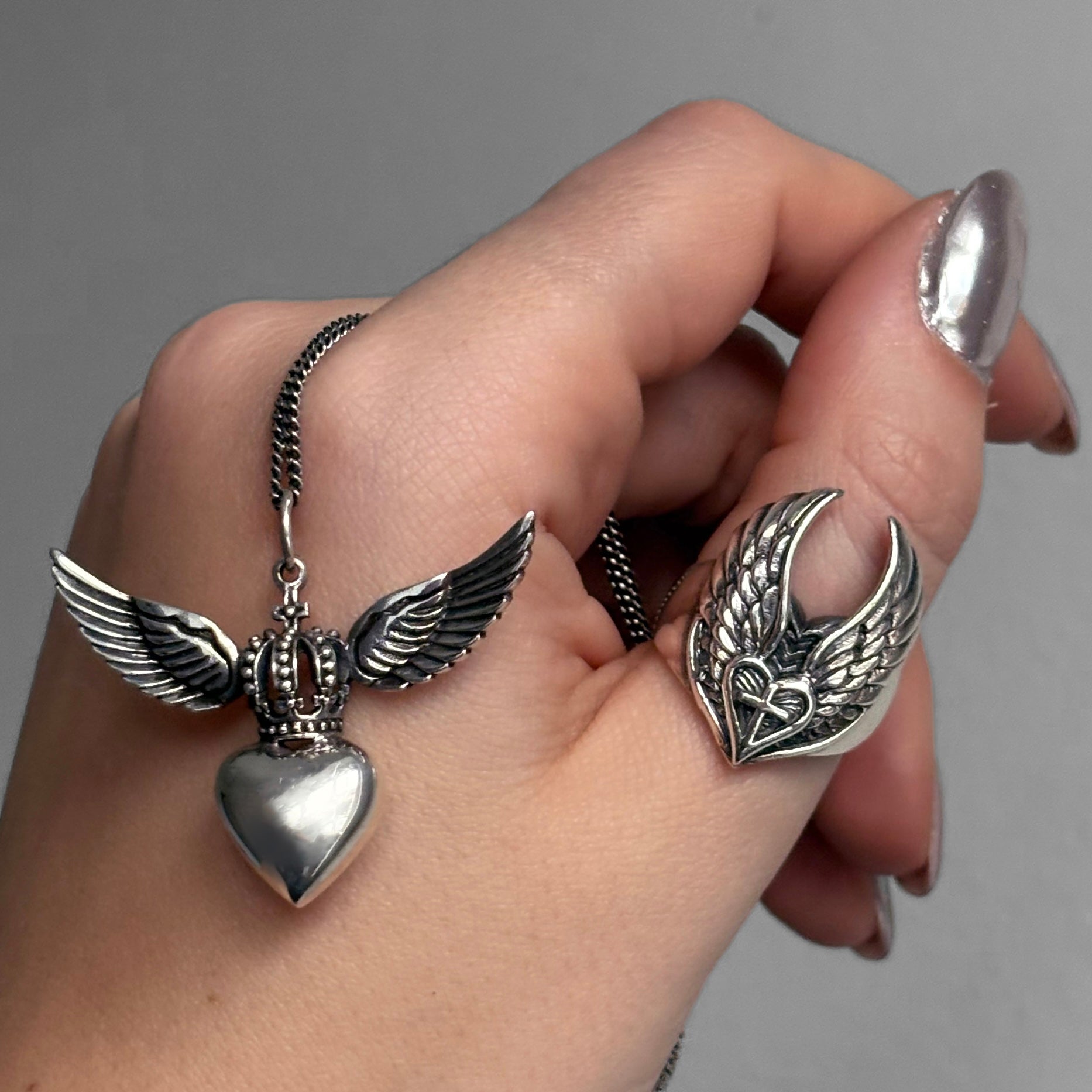 Sterling silver Divine Heart necklace with angel wings and crown pendant on adjustable snake chain, statement jewellery by Angel Rocks