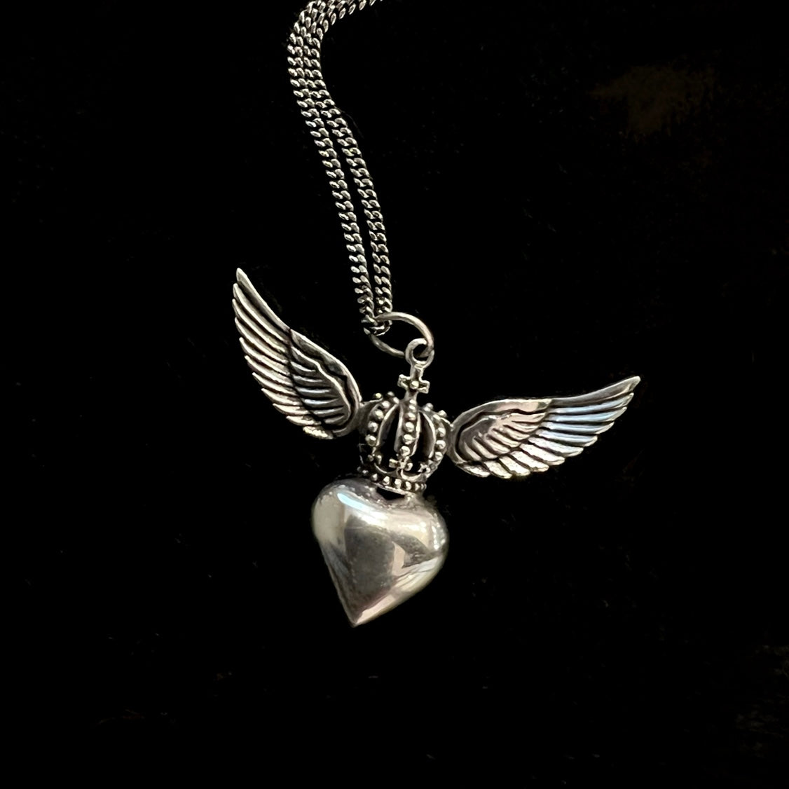 Sterling silver Divine Heart necklace with angel wings and crown pendant on adjustable snake chain, statement jewellery by Angel Rocks