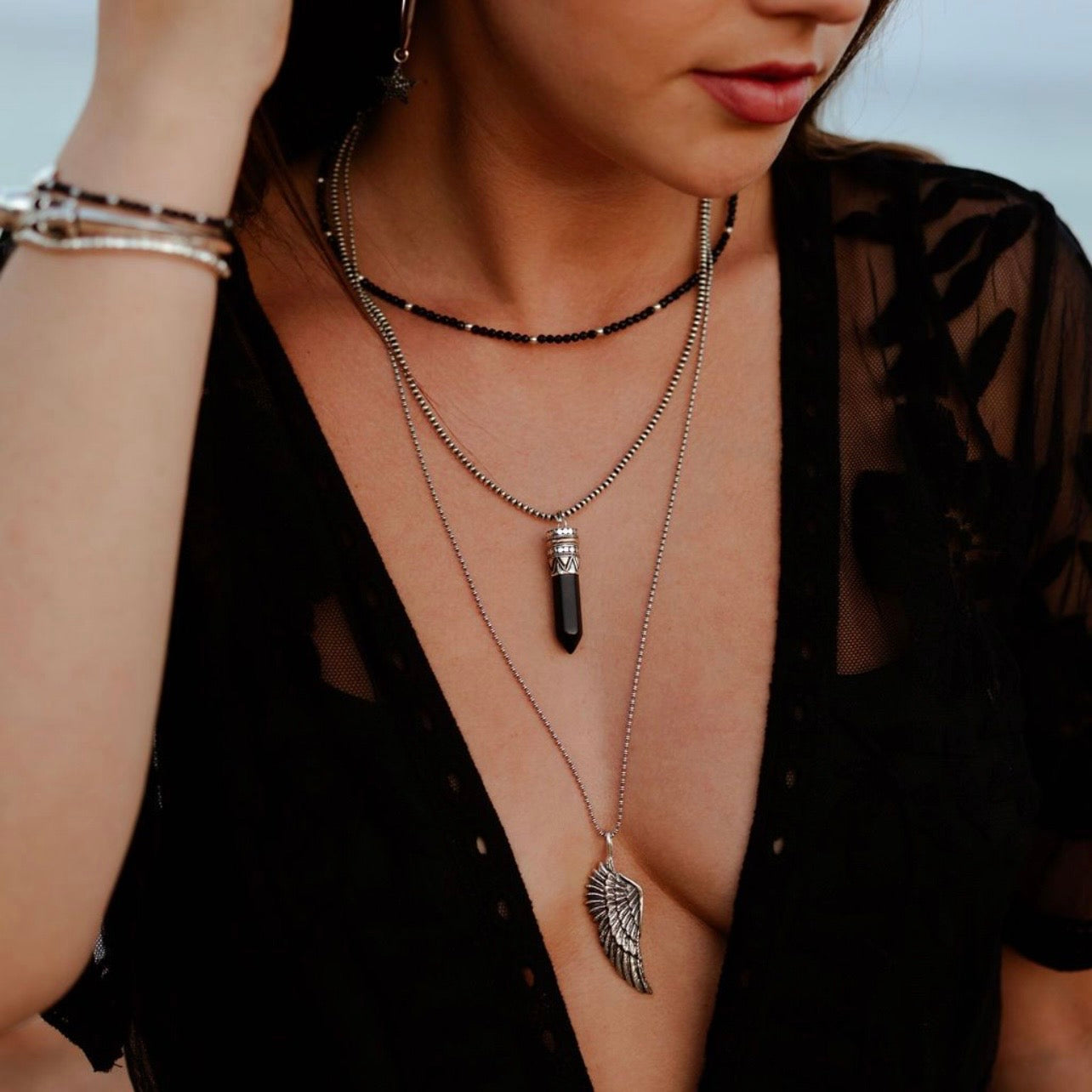 Black Onyx goddess necklace with crystal point pendant set in sterling silver and 18kt rose gold on chunky chain, statement healing jewellery by Angel Rocks