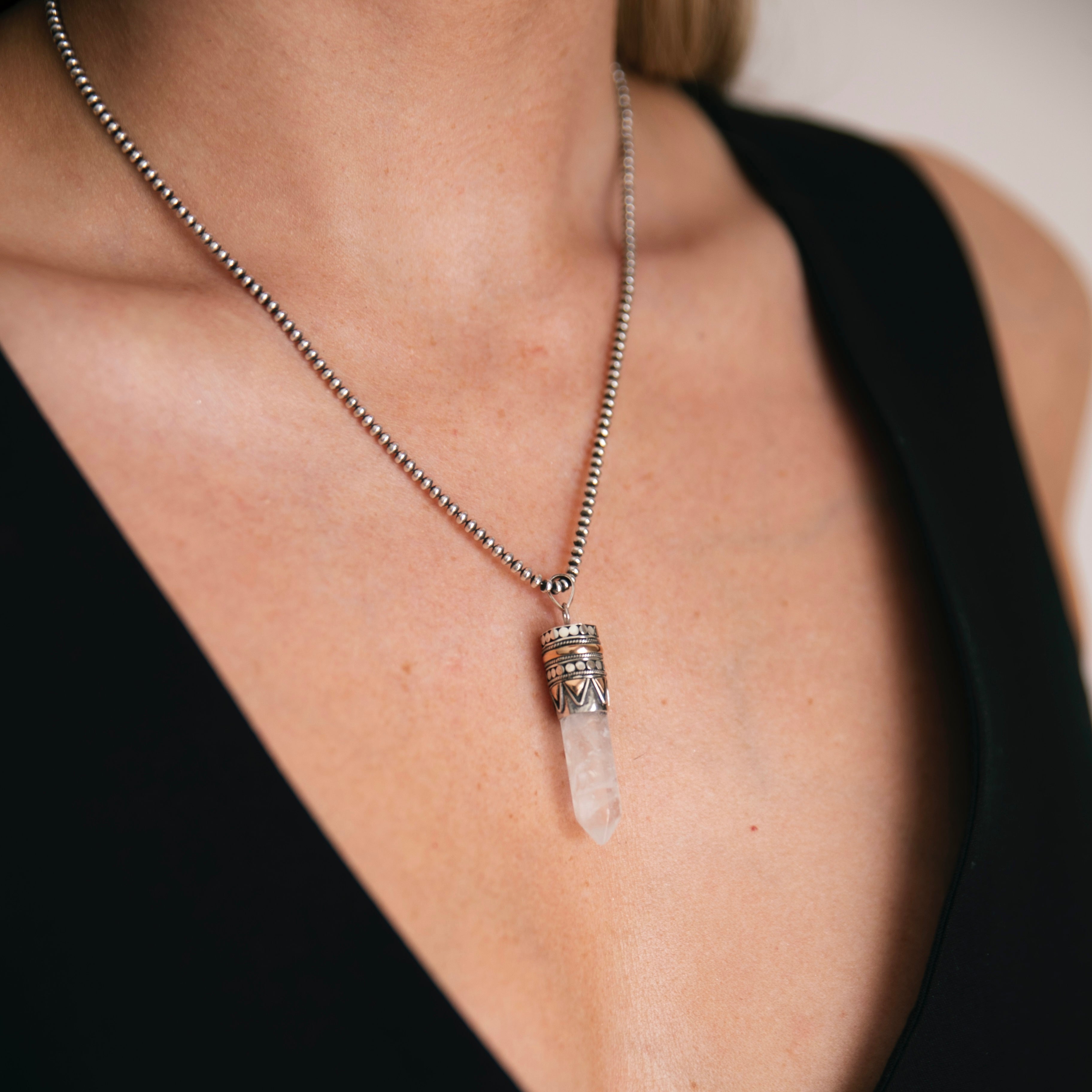 Clear quartz goddess necklace with rock crystal point pendant set in sterling silver and 18kt rose gold on chunky chain, statement healing jewellery by Angel Rocks