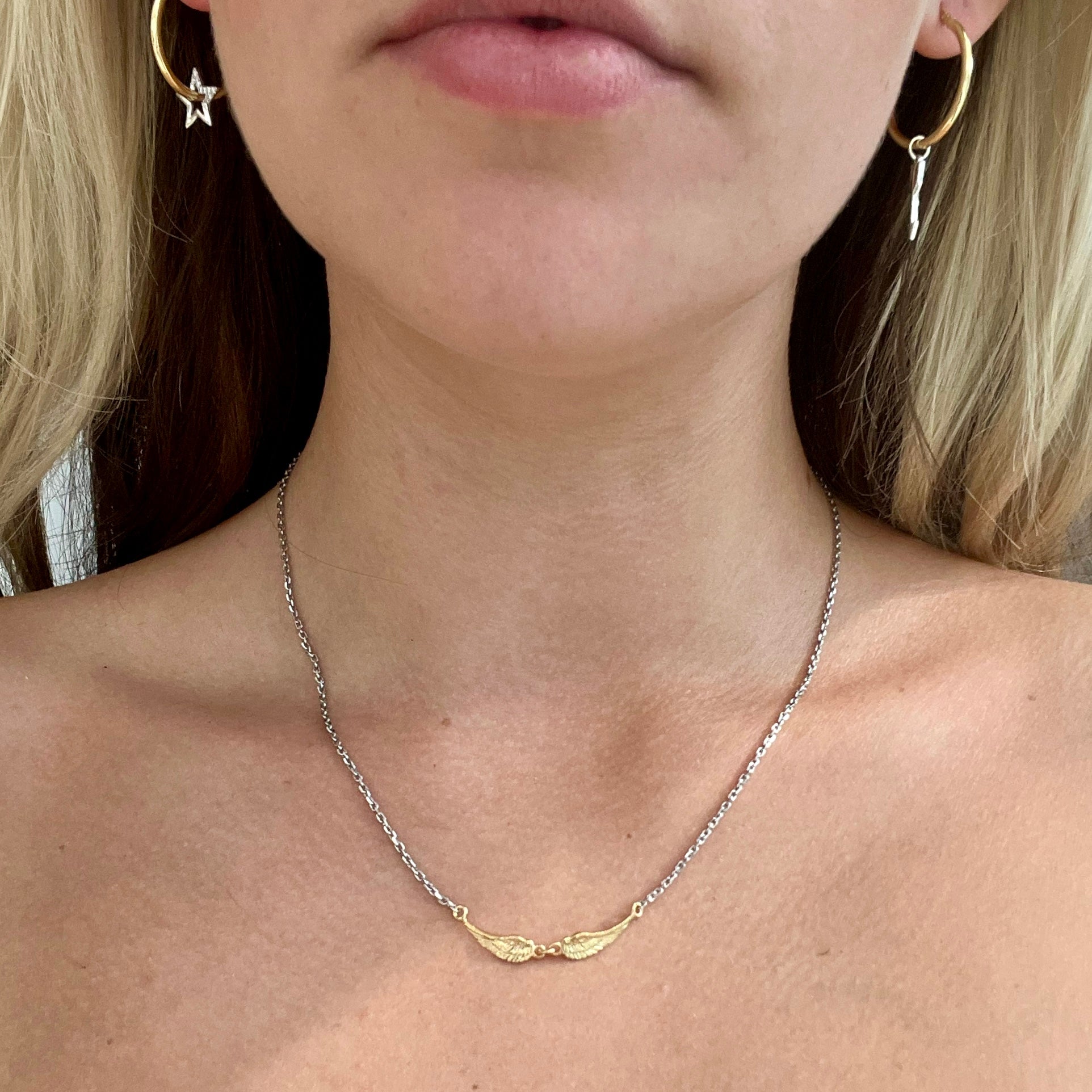 18kt gold plated tiny angel wings necklace with small wing charms on adjustable fine chain by Angel Rocks