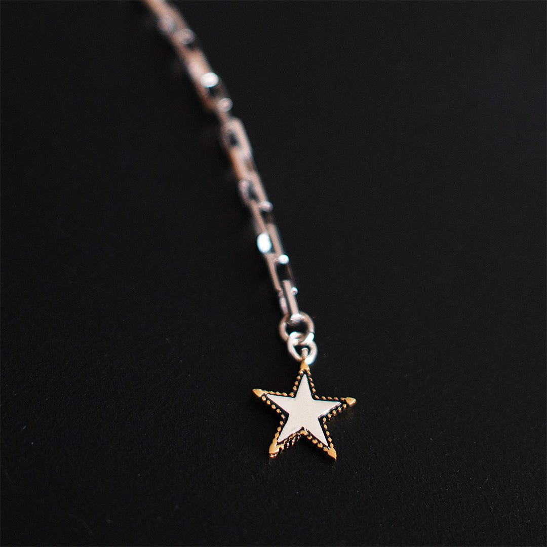 Rock Star lariat necklace with sterling silver chain, gold-edged star charm and adjustable long chain detail by Angel Rocks
