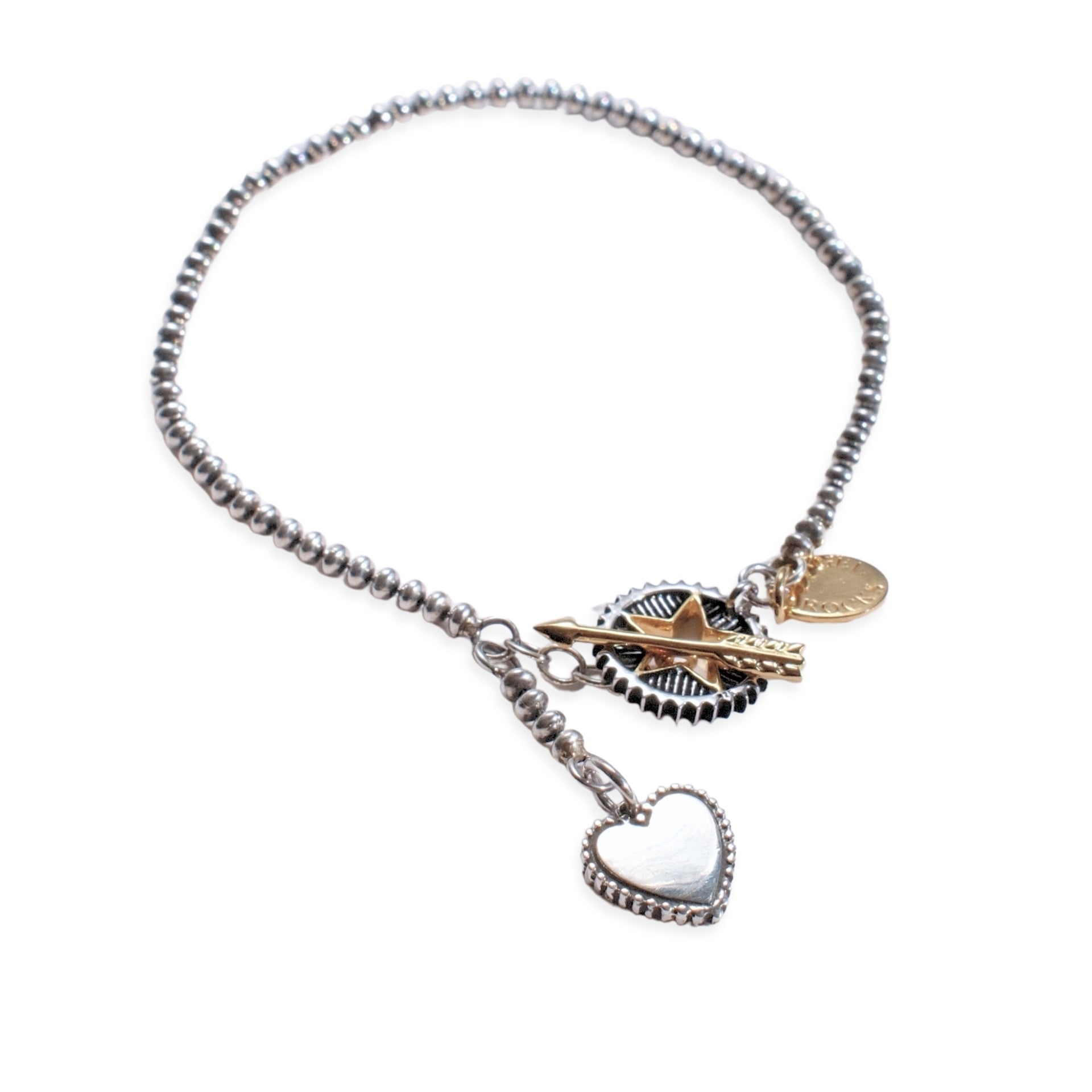 Sterling silver and 18kt gold Rock Star bracelet with star charm and arrow fastening detail by Angel Rocks