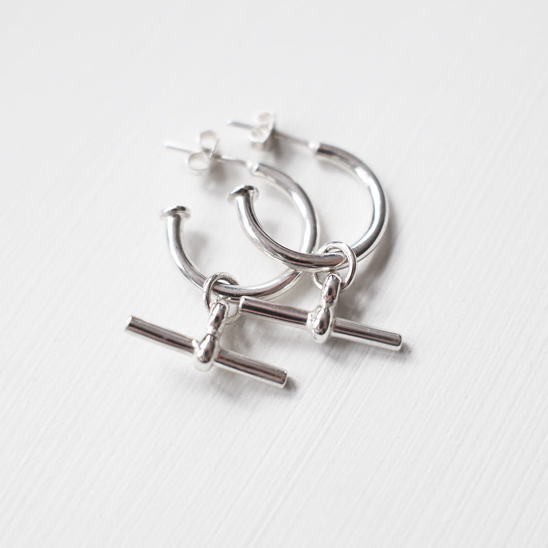 Sterling silver hoop earrings with T-bar drop detail, modern minimalist statement hoops by Angel Rocks