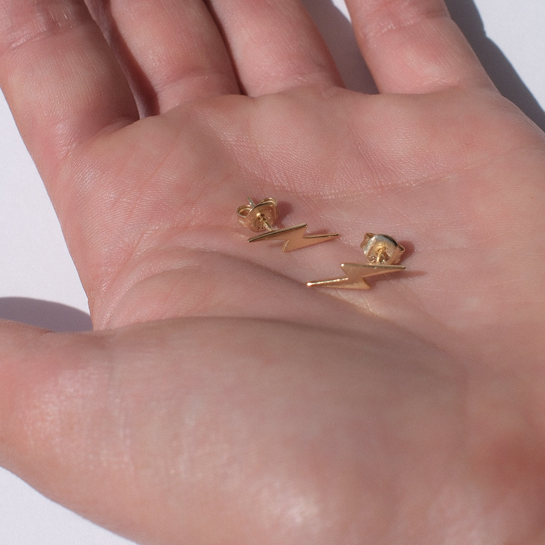 18kt gold plated lightning bolt stud earrings, Angel Rocks