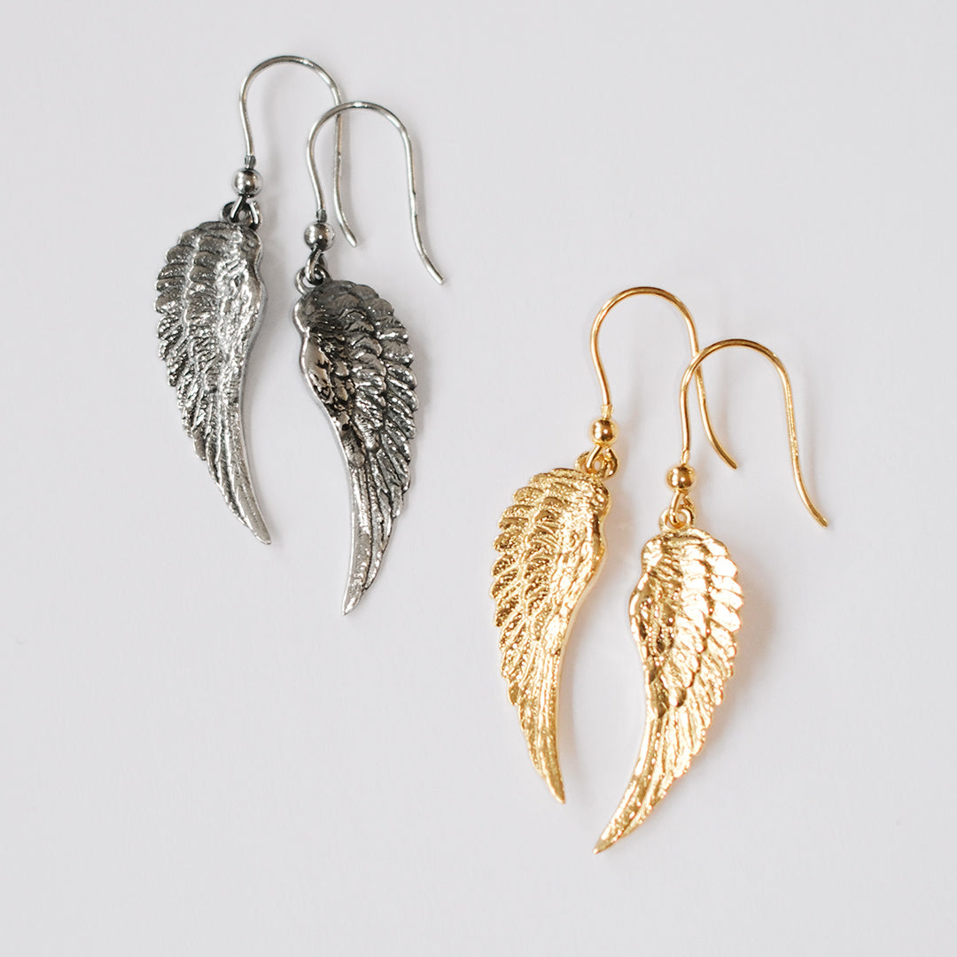 Pair of sterling silver and 18kt gold plated angel wing earrings, handmade wing design by Angel Rocks