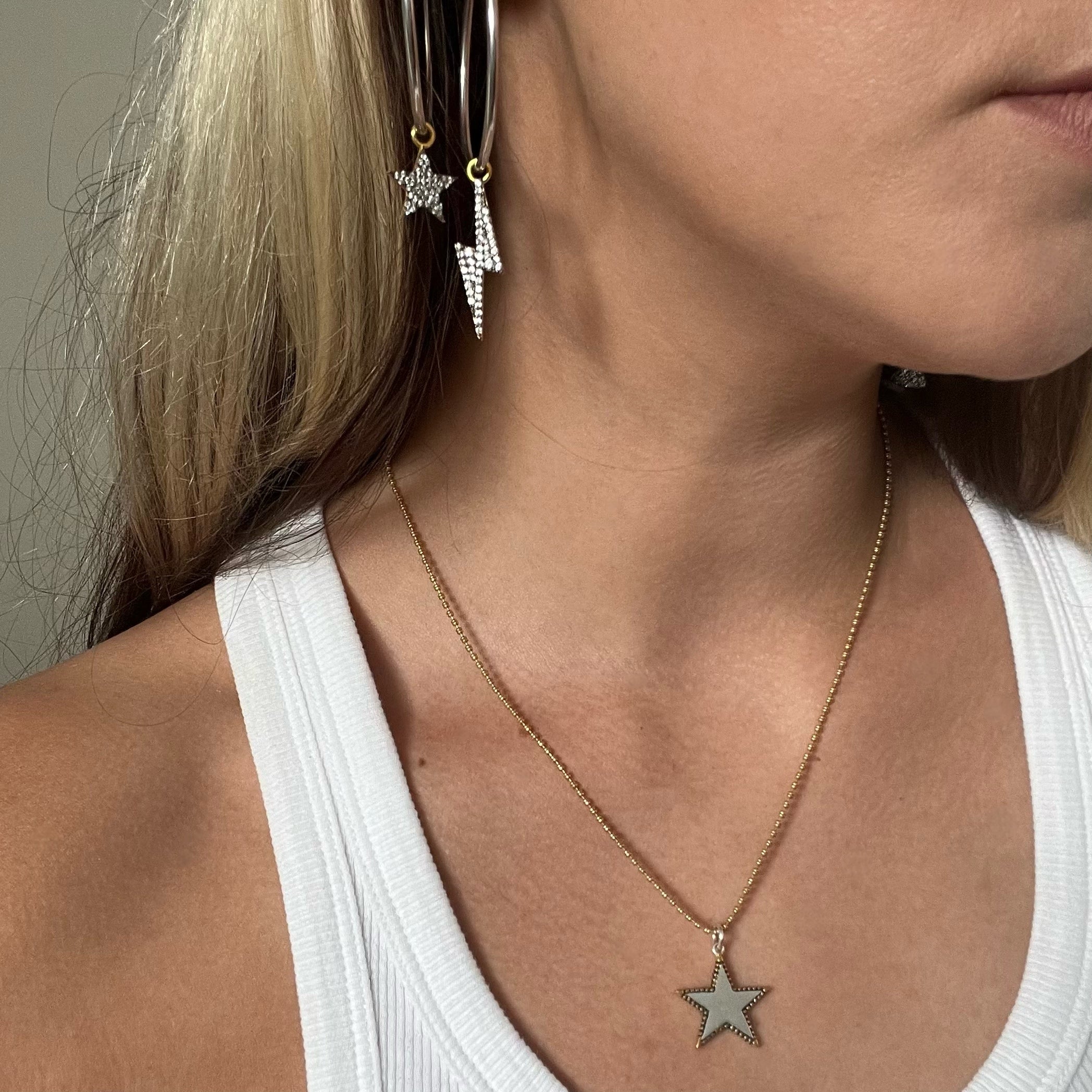 Sterling silver Bowie hoop earrings with detachable cosmic grey diamanté star and lightning bolt charms in mixed metal finish by Angel Rocks