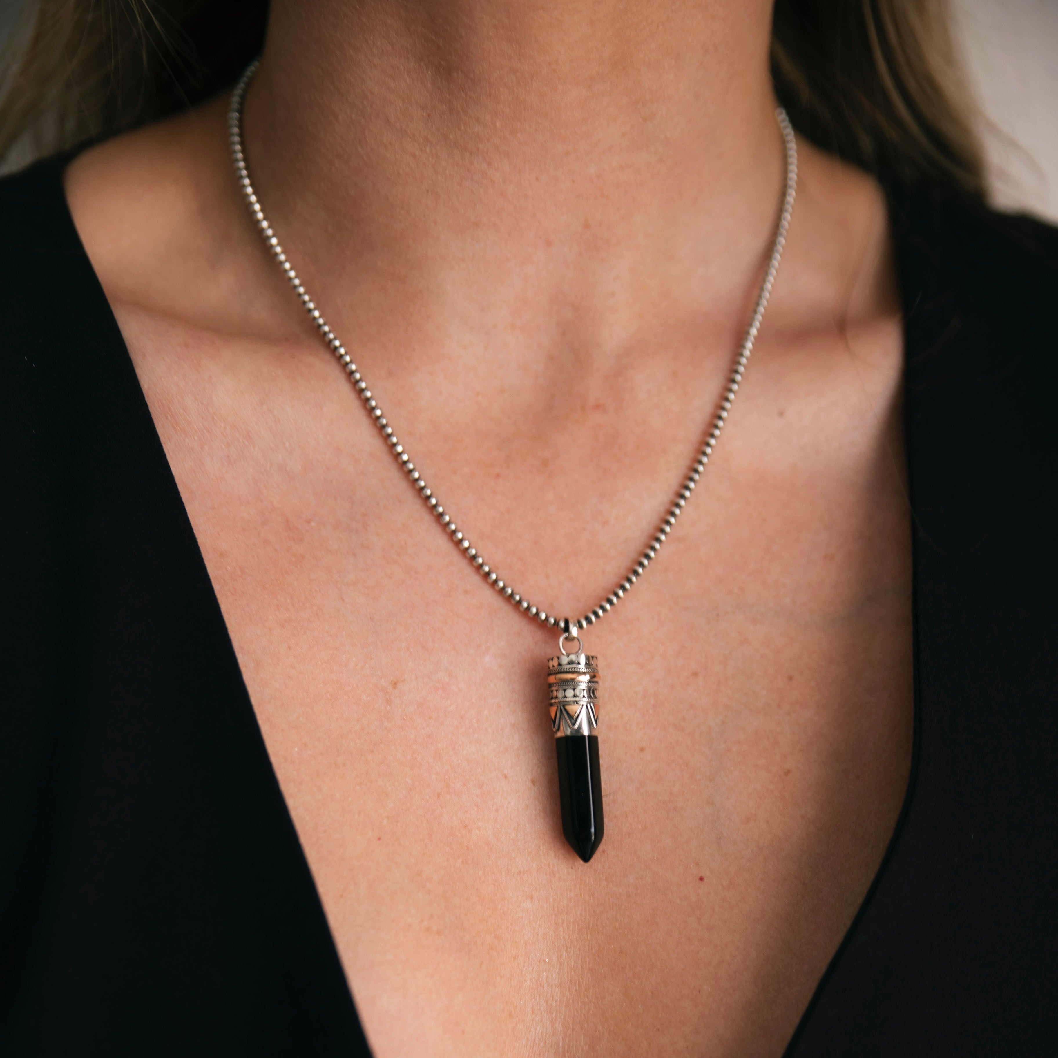 Black Onyx goddess necklace with crystal point pendant set in sterling silver and 18kt rose gold on chunky chain, statement healing jewellery by Angel Rocks