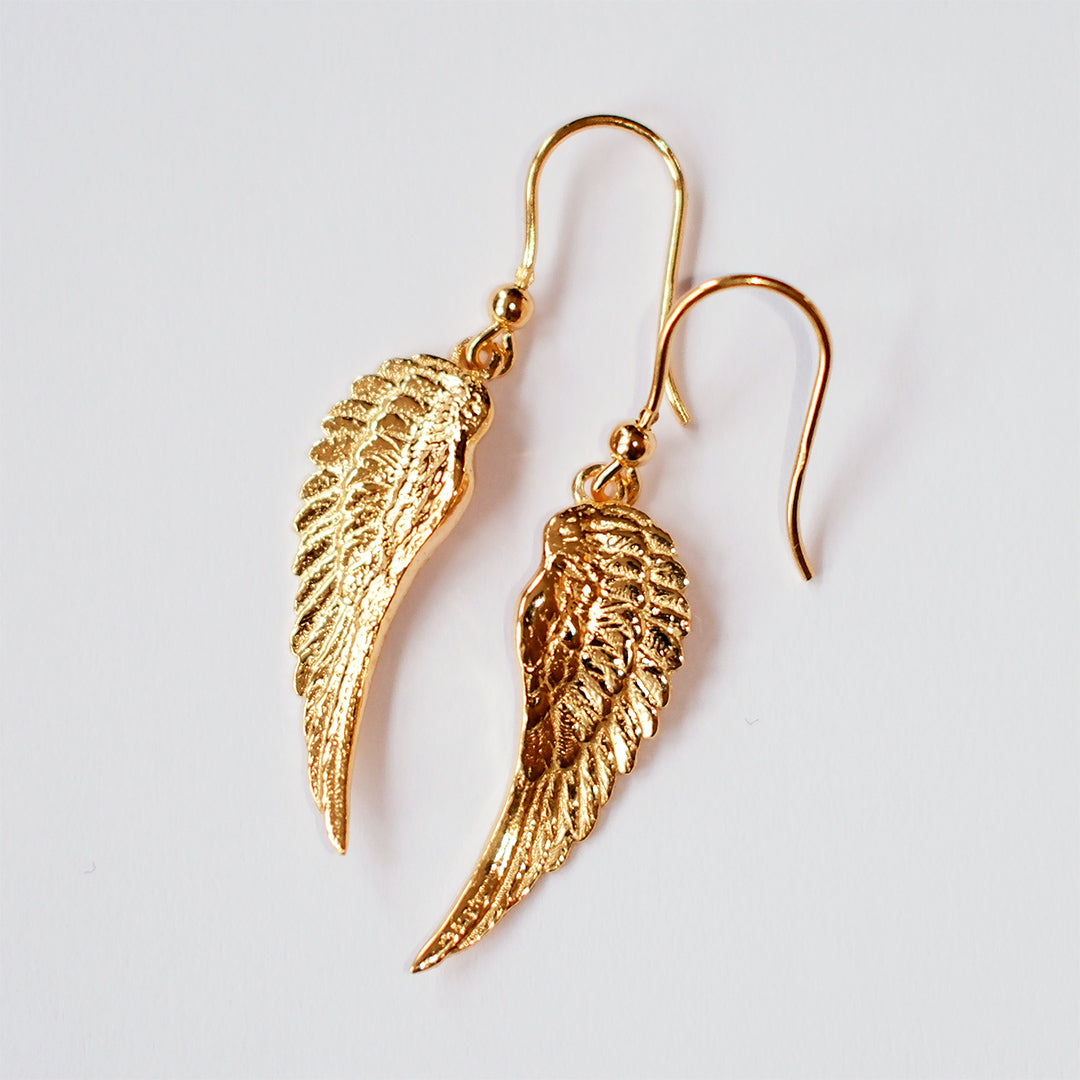 Pair of 18kt gold plated sterling silver angel wing earrings, handmade wing design by Angel Rocks
