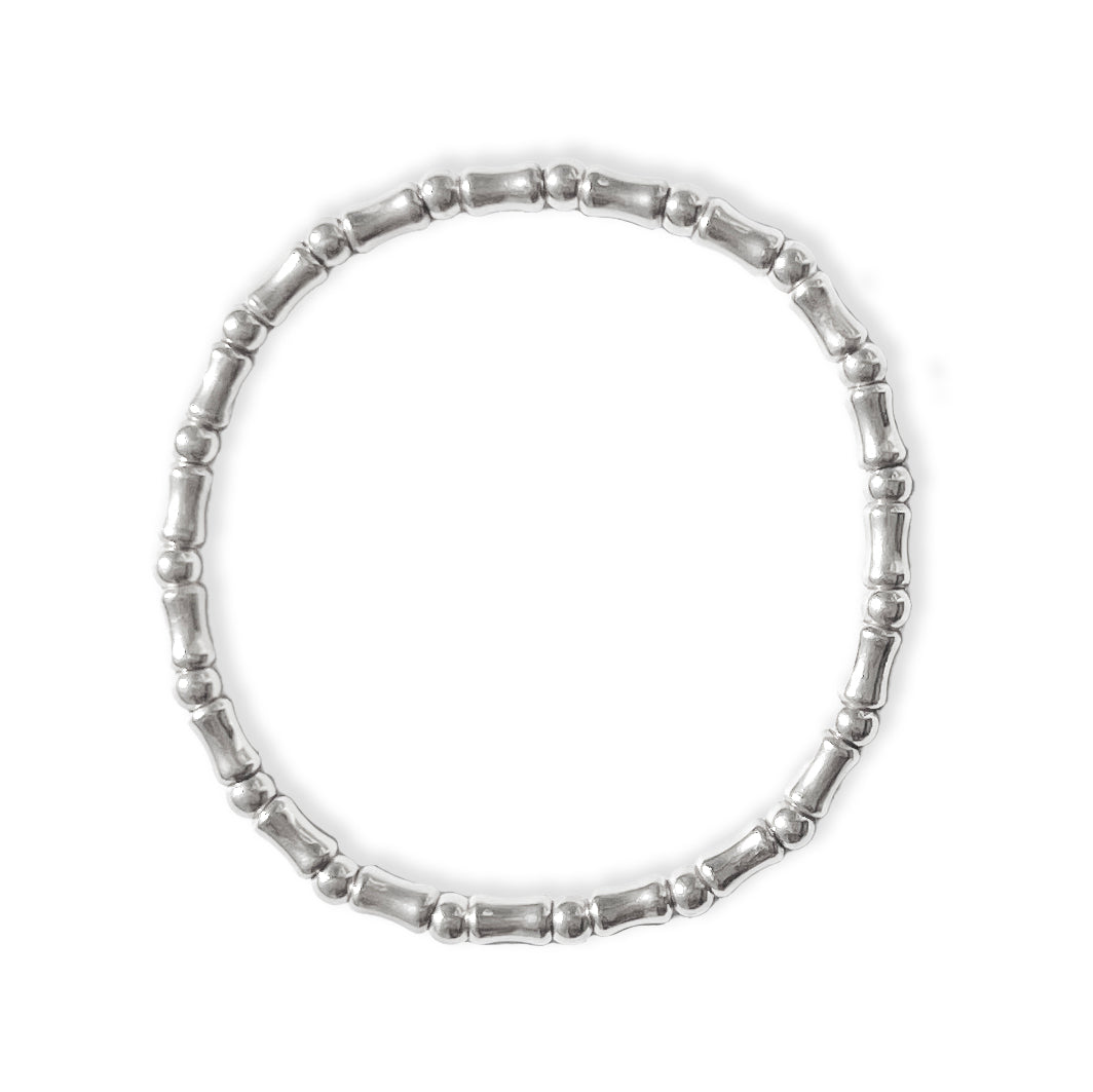 Sterling silver mini bones stretch bracelet, stackable design bracelet for layered styling by Angel Rocks