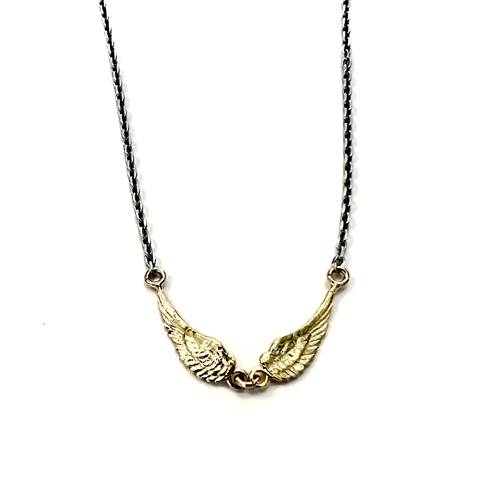 18kt gold plated tiny angel wings necklace with small wing charms on adjustable fine chain by Angel Rocks