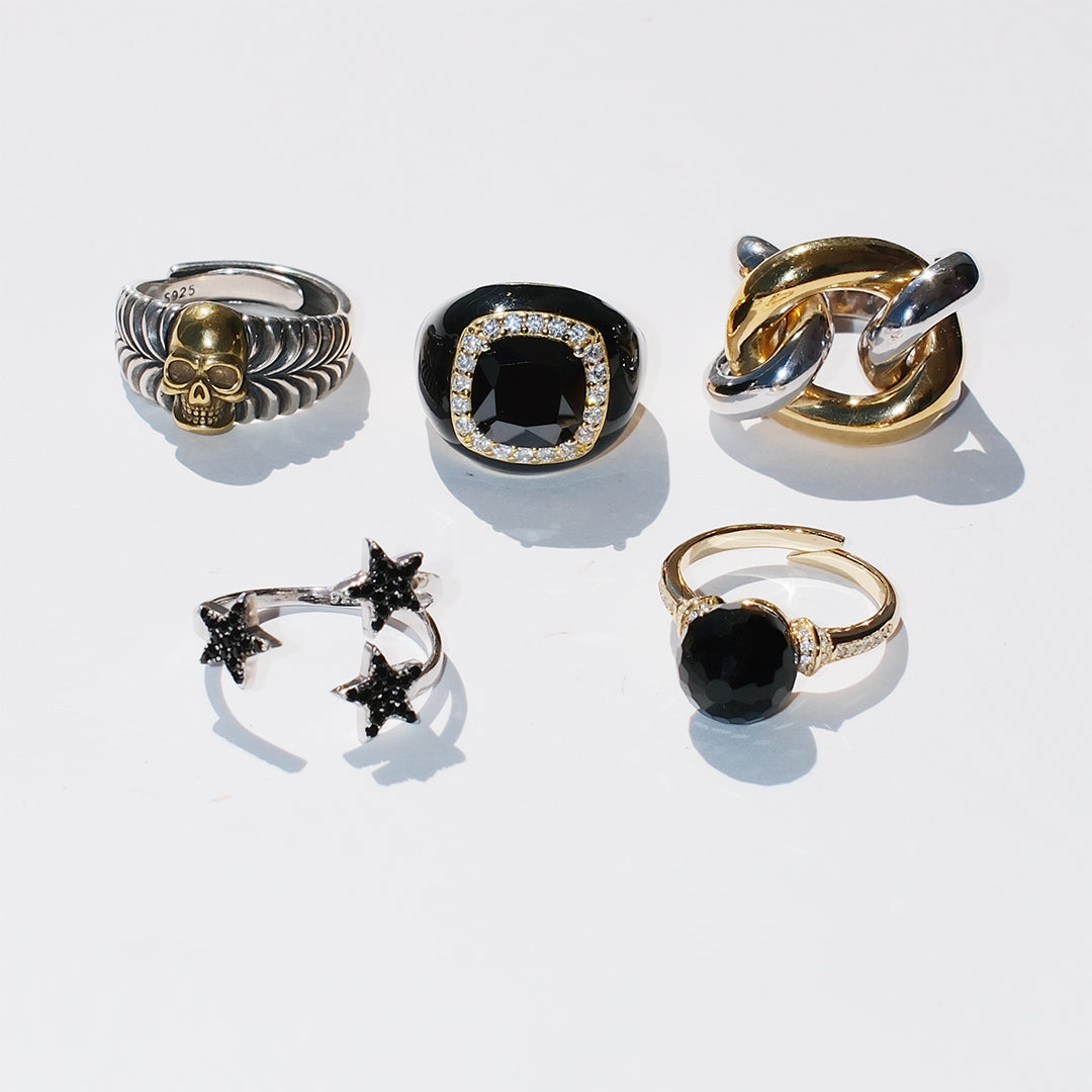 Five unique rings on a light gray background