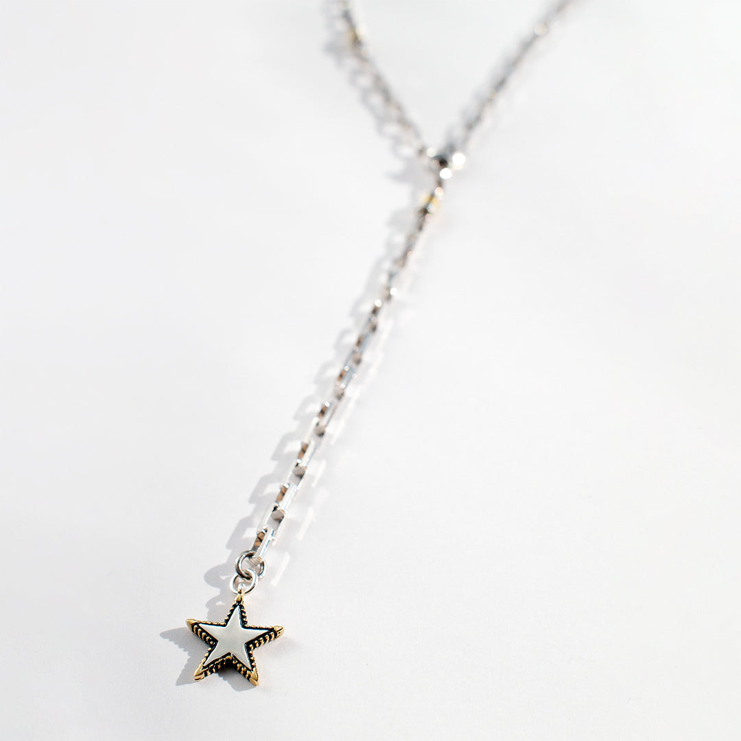 Rock Star lariat necklace with sterling silver chain, gold-edged star charm and adjustable long chain detail by Angel Rocks