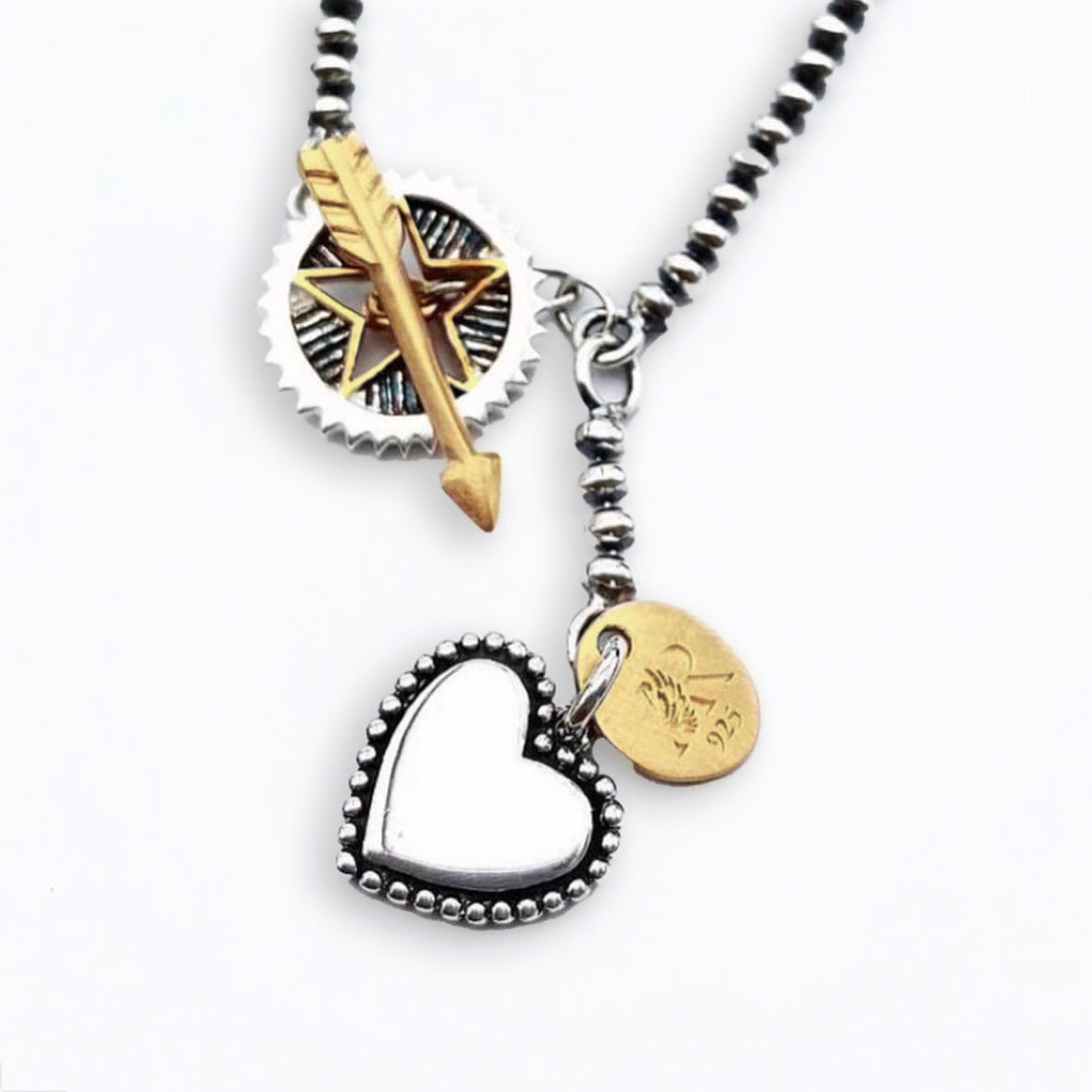 Sterling silver and 18kt gold Rock Star bracelet with star charm and arrow fastening detail by Angel Rocks