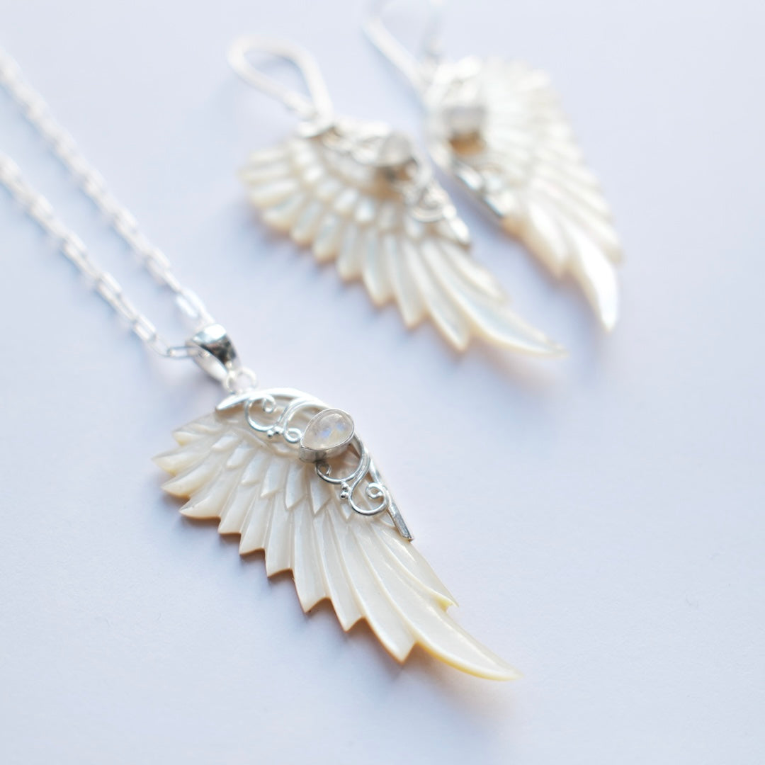 Sterling silver hand carved wing necklace with mother of pearl pendant and moonstone detail sterling silver chain, statement jewellery by Angel Rocks