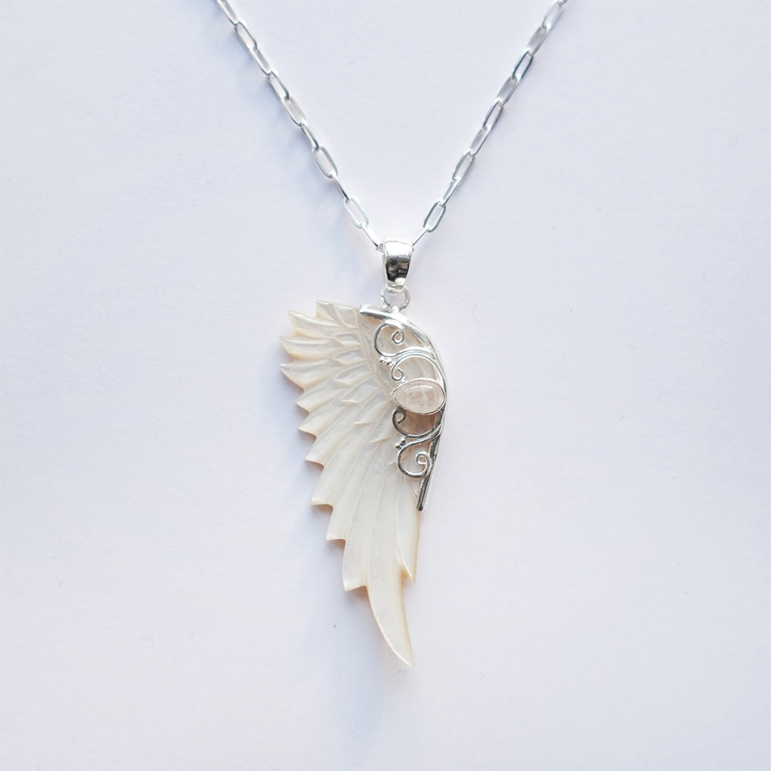Sterling silver hand carved wing necklace with mother of pearl pendant and moonstone detail sterling silver chain, statement jewellery by Angel Rocks