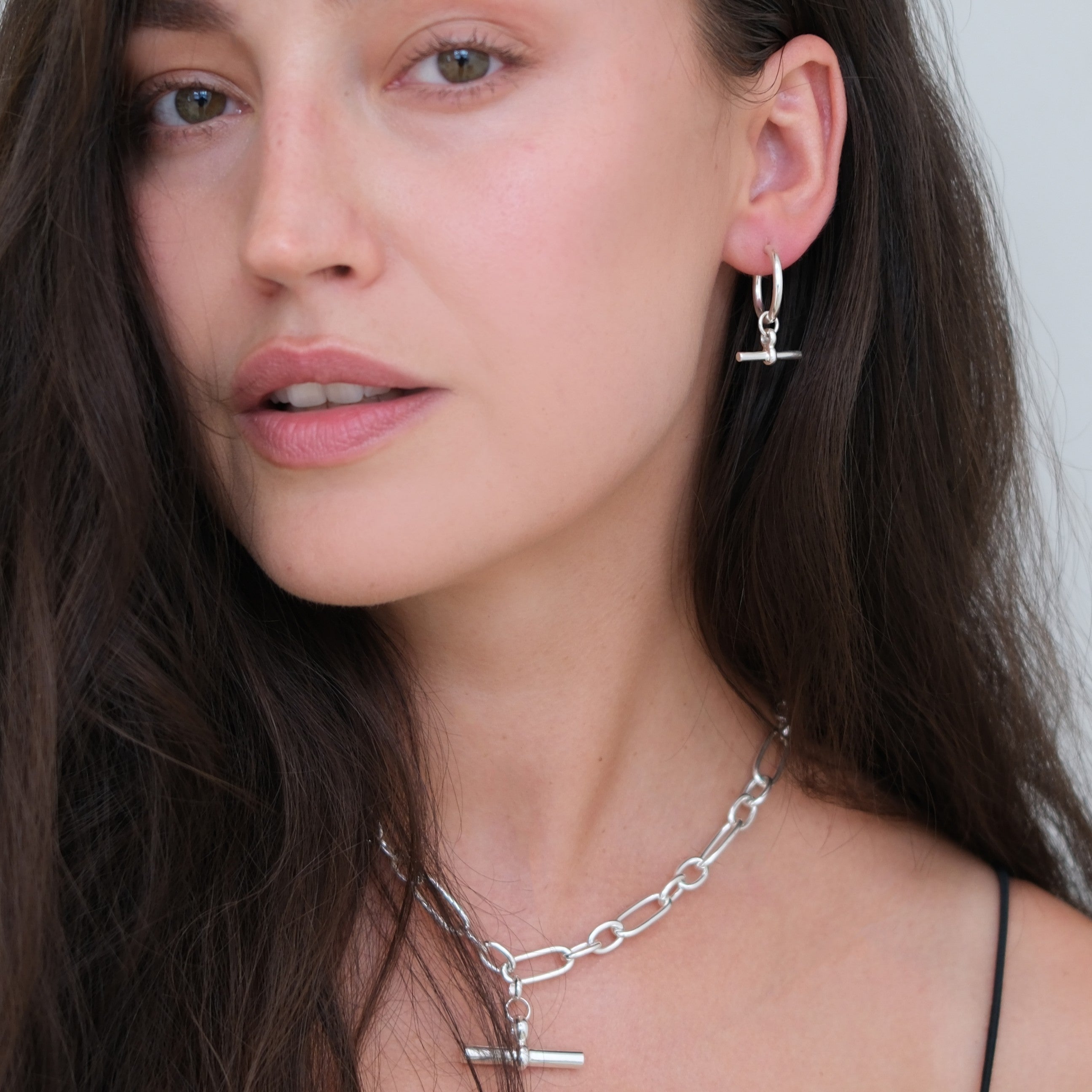Sterling silver hoop earrings with T-bar drop detail, modern minimalist statement hoops by Angel Rocks