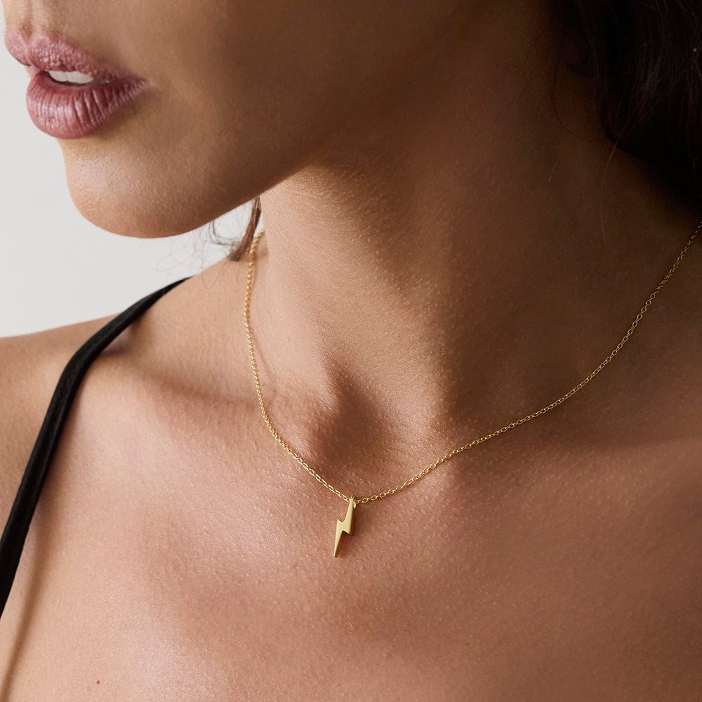 18kt gold plated sterling silver tiny lightning bolt necklace on fine adjustable chain, minimalist statement layering necklace by Angel Rocks