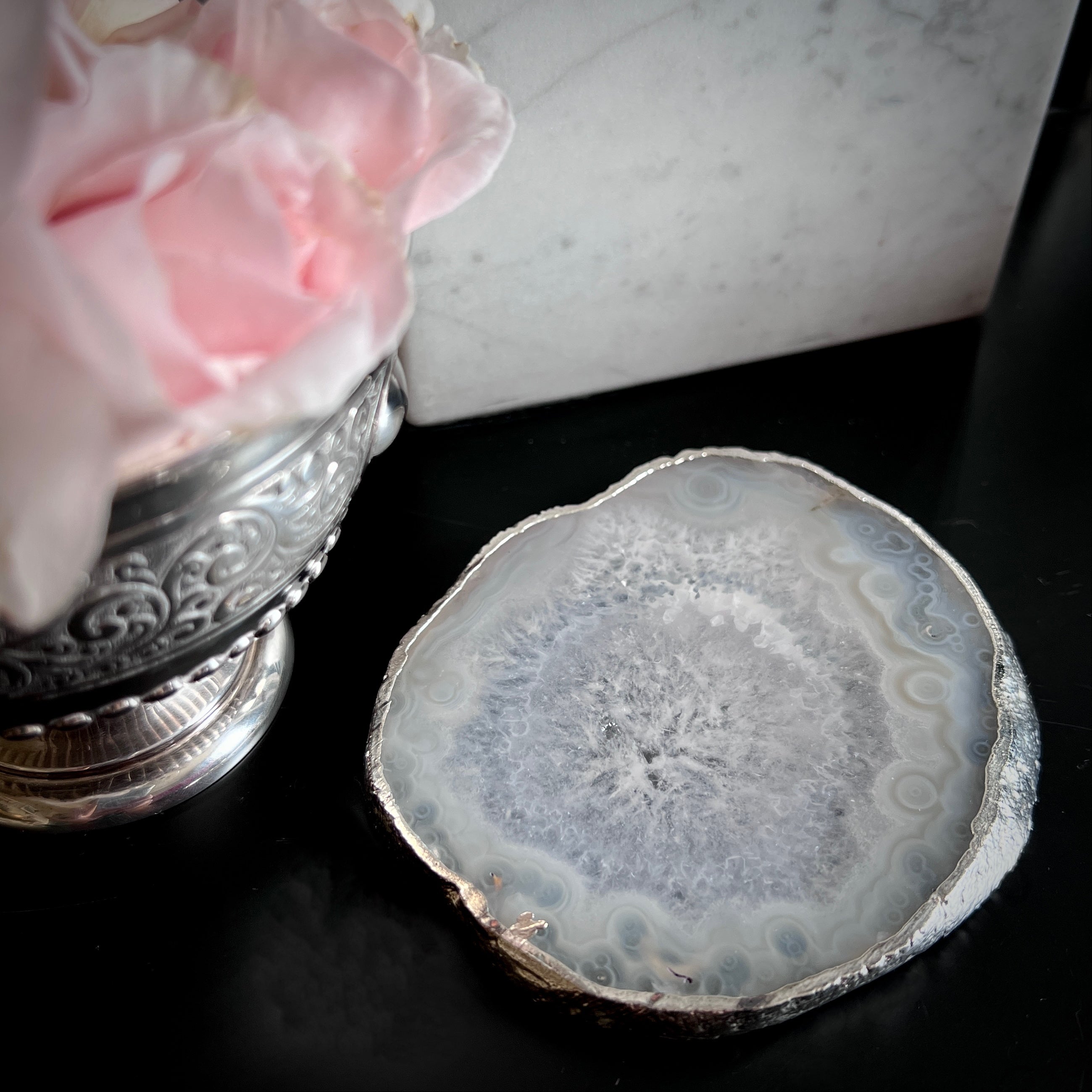 White agate, clear quartz crystal coaster with silver edge detail, used as candle stand or drinks mat by Angel Rocks